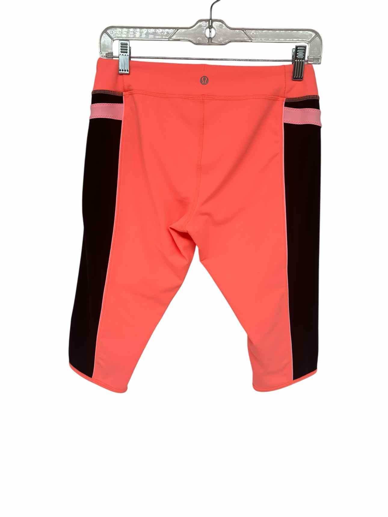 Lululemon Heat It Up Crop Orange Legging Size 10