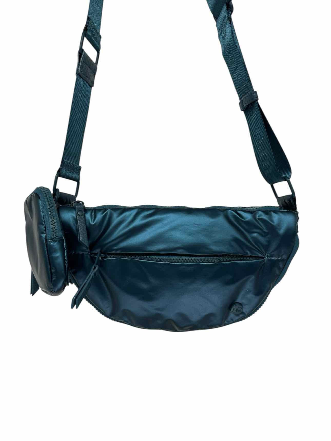 Samantha Brown Half Moon Travel Sling Blue Vinyl Sling bag