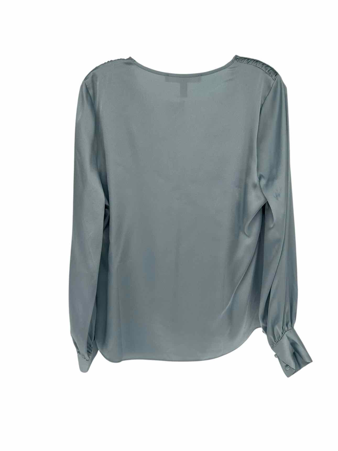 White House Black Market Lt. Blue Size M Long Sleeve Top