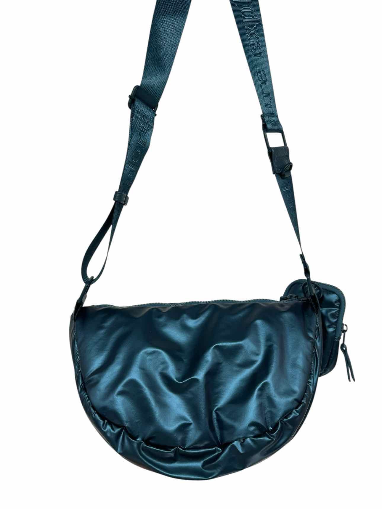Samantha Brown Half Moon Travel Sling Blue Vinyl Sling bag