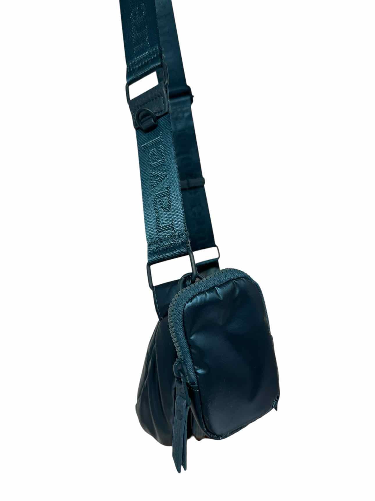 Samantha Brown Half Moon Travel Sling Blue Vinyl Sling bag